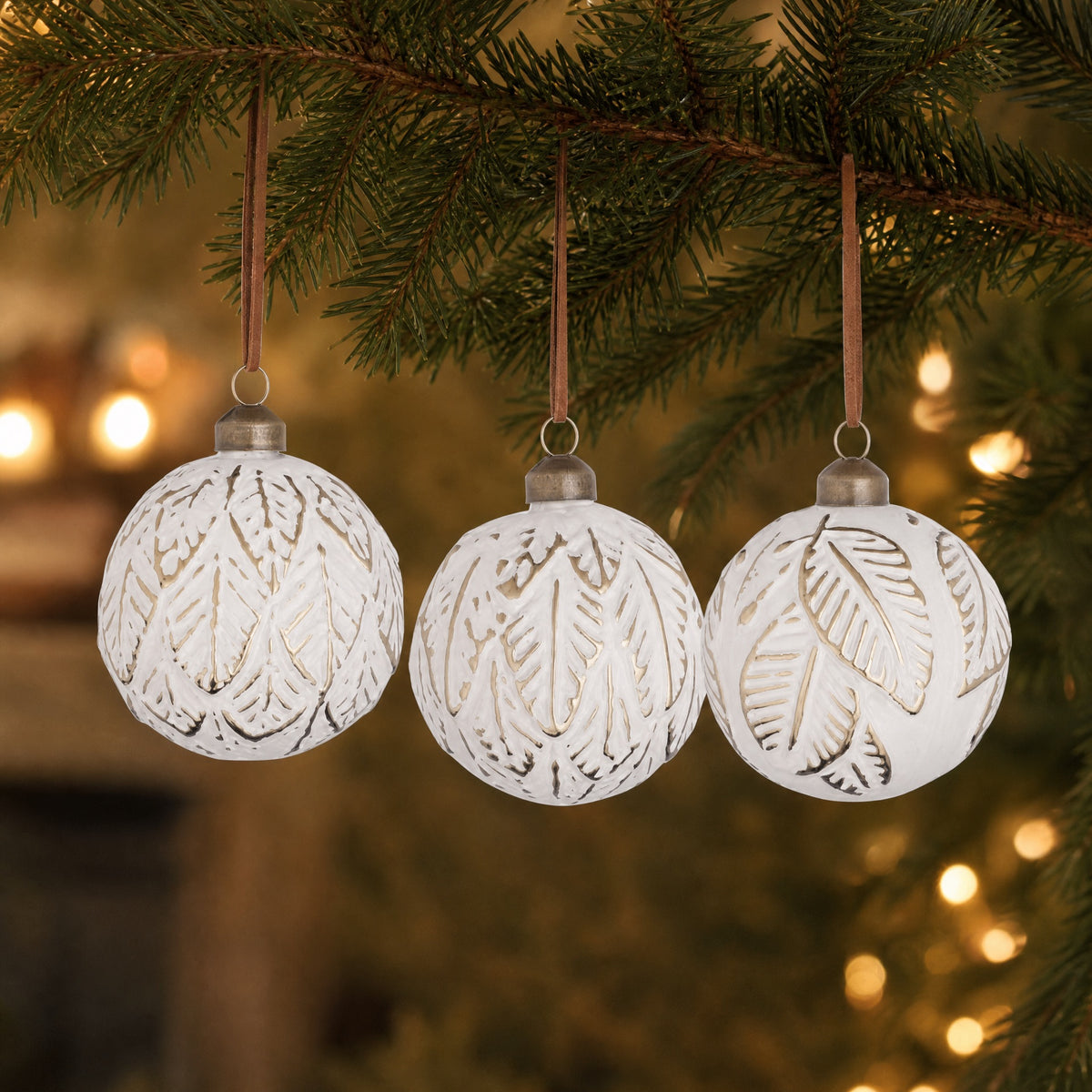 White Christmas ball with leaf pattern