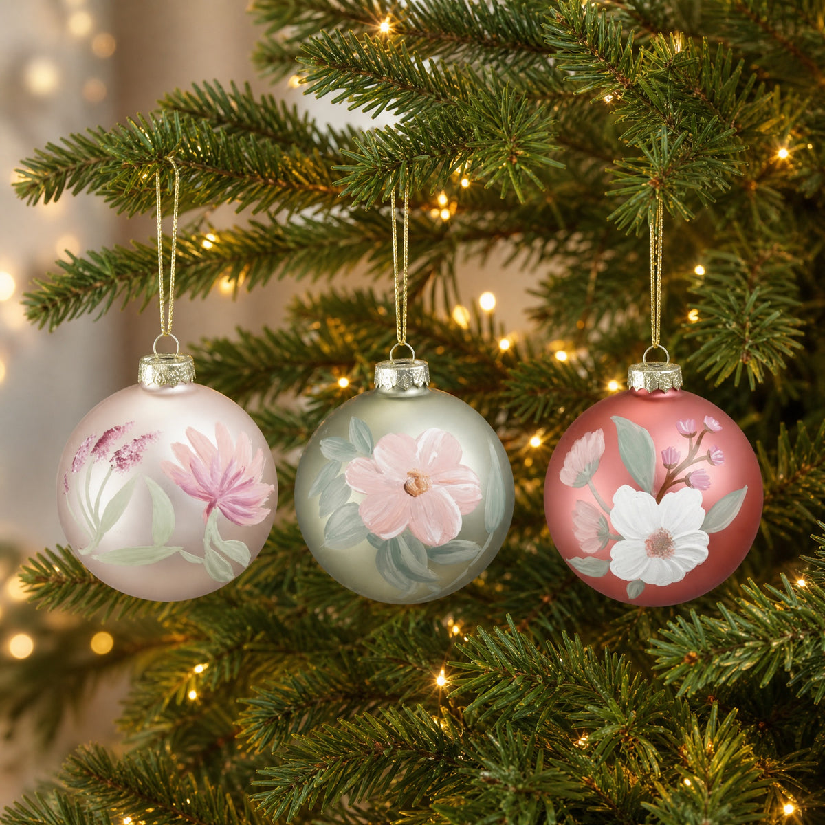 Christmas baubles with painted flowers