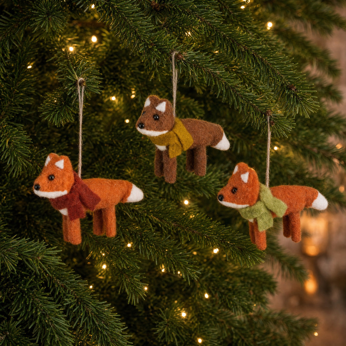 Foxes in felt/wool for hanging