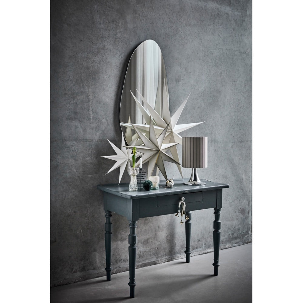 Console table decorated with three stars from House Doctor