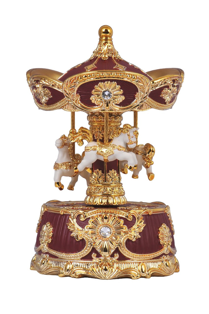 Nostalgic carousel from Musicboxworld in burgundy and gold with white horses, golden ornaments and a mechanical music movement