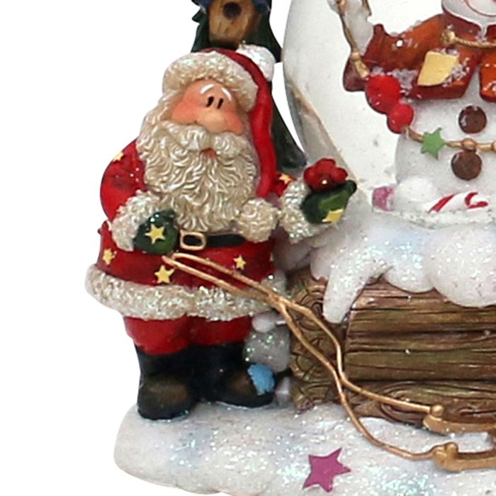 Snow globe with Santa Claus in the snow