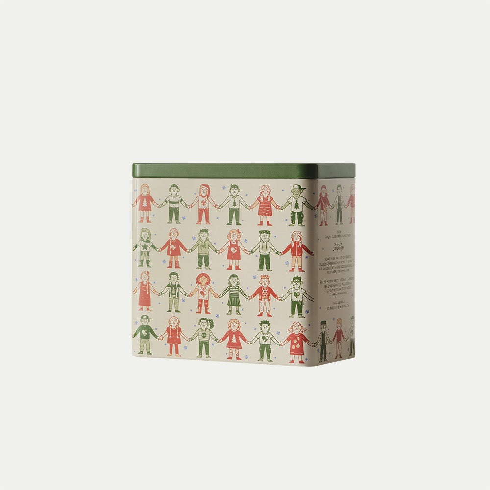 Julemærket 2026 cookie tin featuring children holding hands