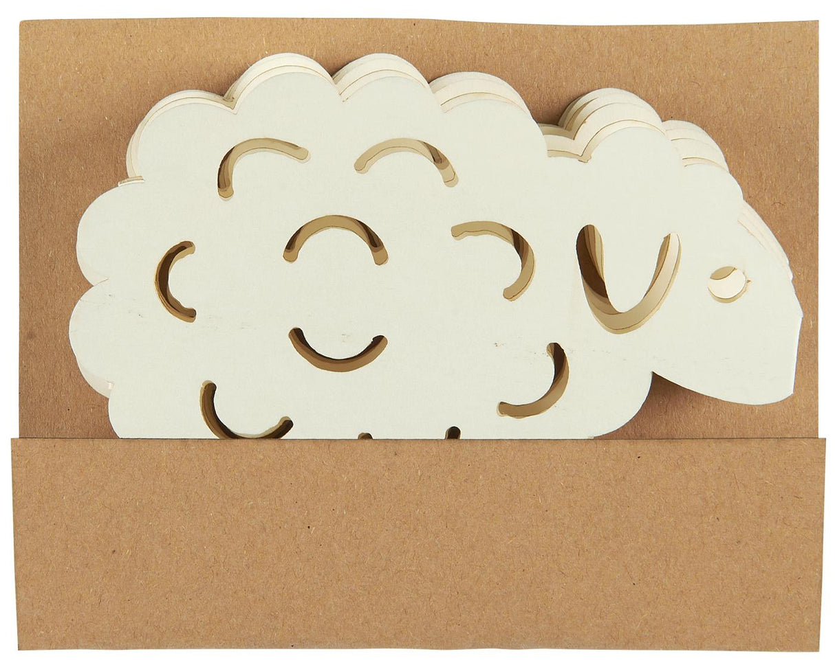 Indpakning med papirklip med lam fra Ib Laursen