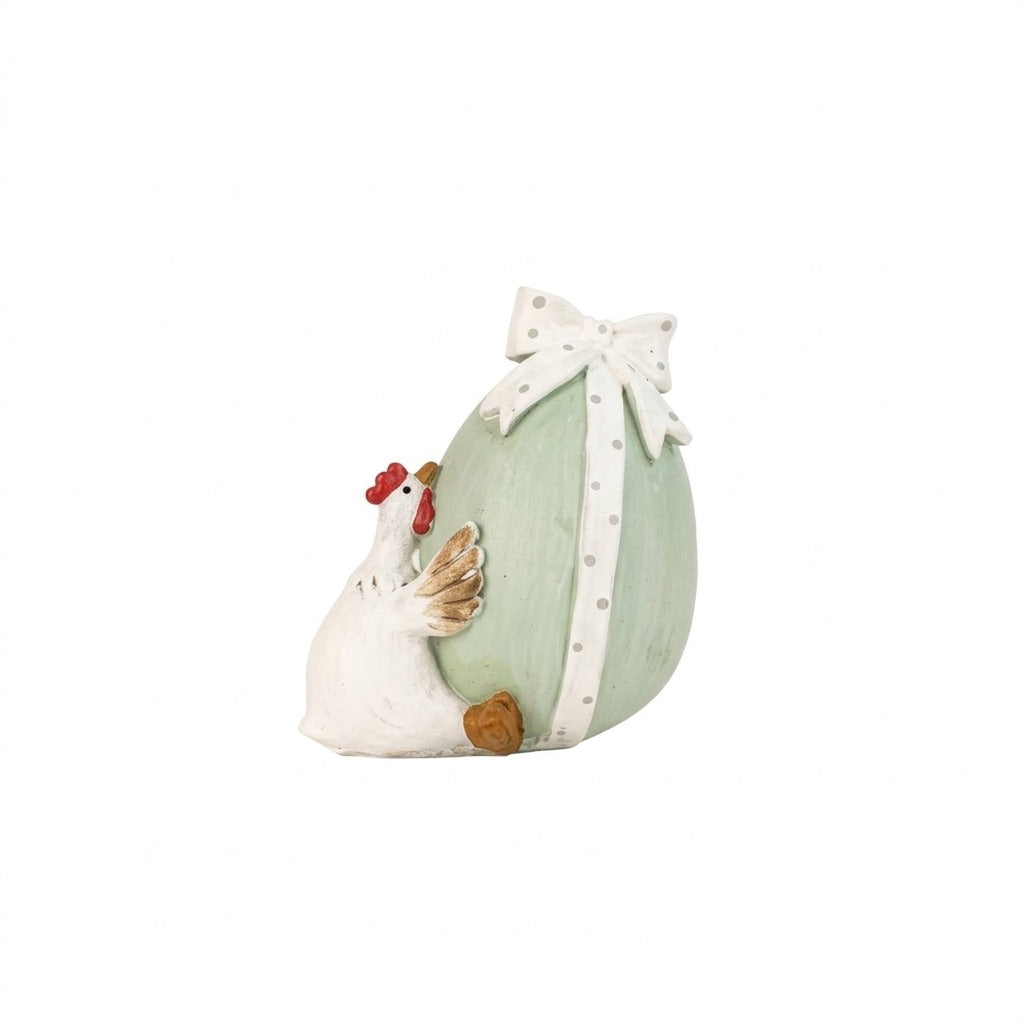 Easter egg with bow and chicken