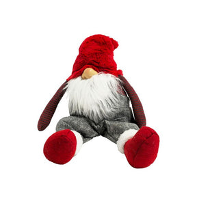 Gnom med rødt tøj siddende