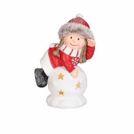 Boy and girl on snowball