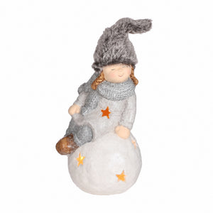 Winter children on lighted snowball