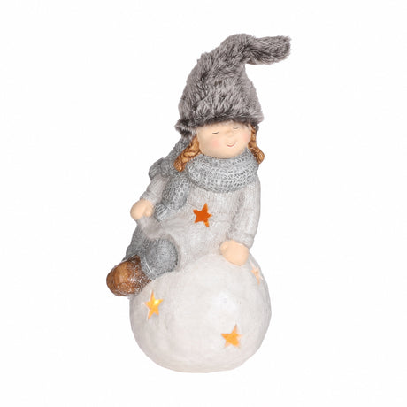 Winter children on lighted snowball