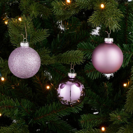 Julekugler i lilla nuancer med glitter