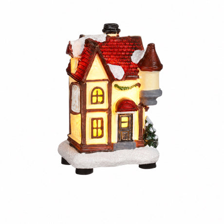 Small lighted Christmas house
