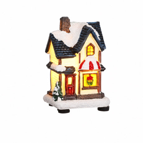 Small lighted Christmas house