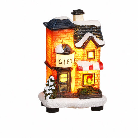 Small lighted Christmas house