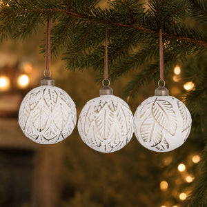 White Christmas ball with leaf pattern