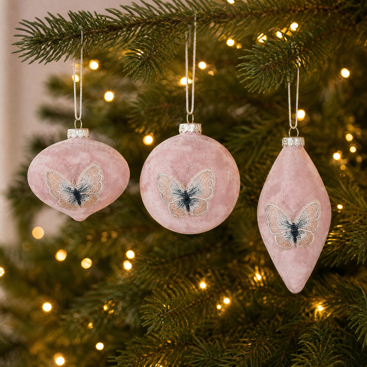Pink Christmas ball with butterfly