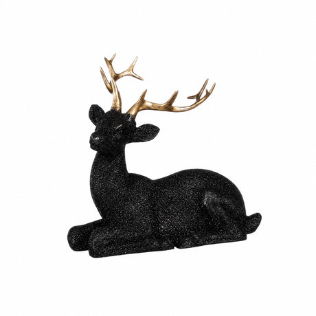 Recumbent sparkling black deer