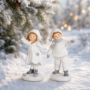 Winter children in white clothes