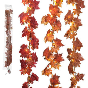 Ahornbladranke med lys