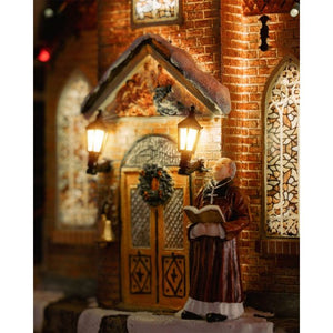 Luville Murstenskirke med præst