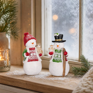 Snowmen with forest animals