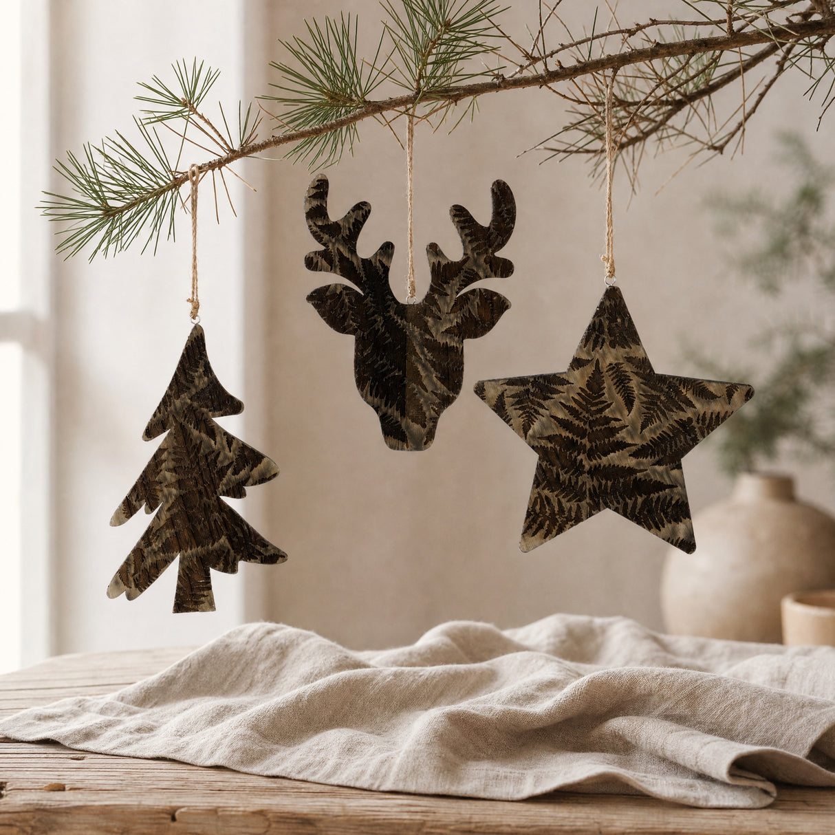 Wooden ornament with fern leaves