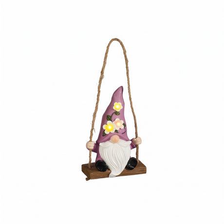 Garden gnome on swing with solar lights