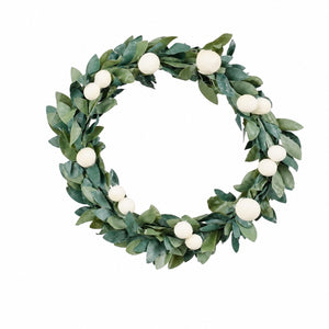 Green mini wreath for napkins and candles with white berries