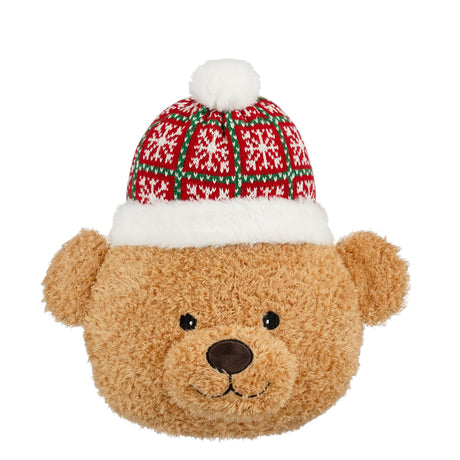 Decorative cushion shaped like a Christmas teddy bear wearing a knitted hat
