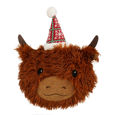 Cow-shaped decorative pillow with Santa hat