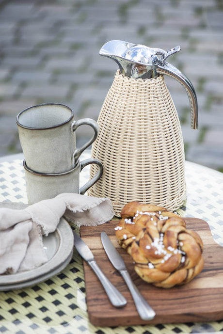 Breakfast table with cups and coffee pot from Ib Laursen