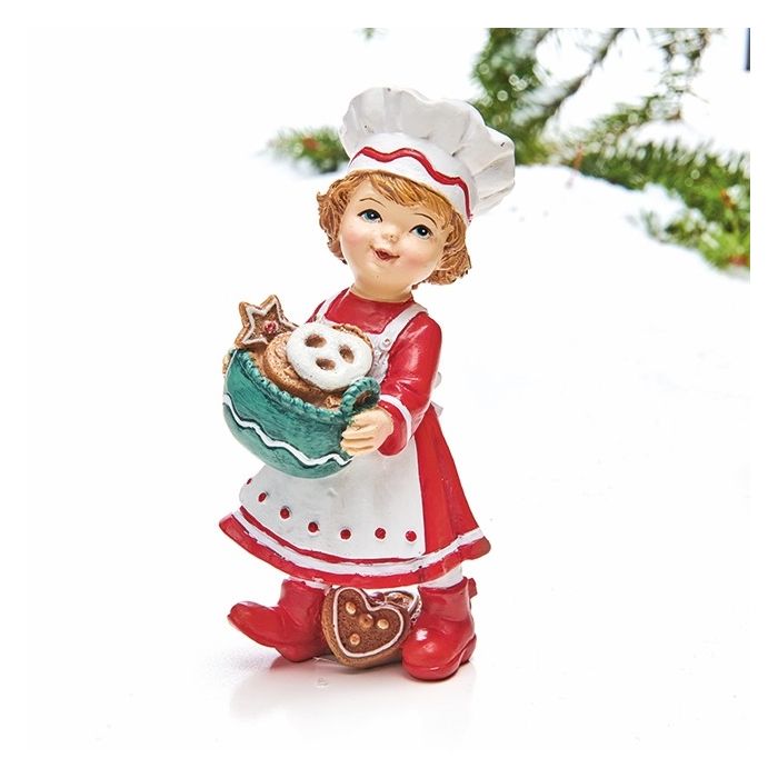 Pige med juletøj og kurv med småkager. Julefigur fra Pobra. 