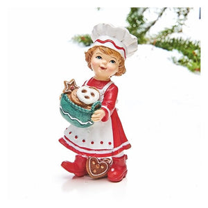 Pige med juletøj og kurv med småkager. Julefigur fra Pobra. 