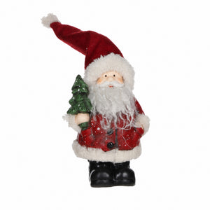 Santa Claus with Christmas tree or lantern