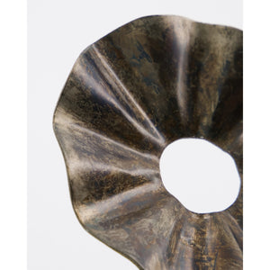 Close-up of an antique brown metal candle wreath from House Doctor