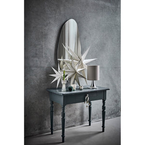Console table decorated with three stars from House Doctor