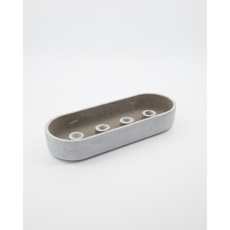 Grey concrete candle holder with four candle sockets in the base from House Doctor