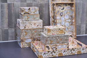 Decorative floral storage boxes from Speedtsberg, available in various sizes with light floral motifs and gold accents
