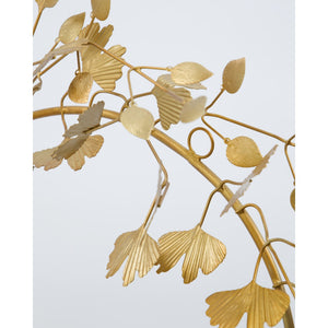 Close-up of the hanger on a gold wreath with leaves from House Doctor