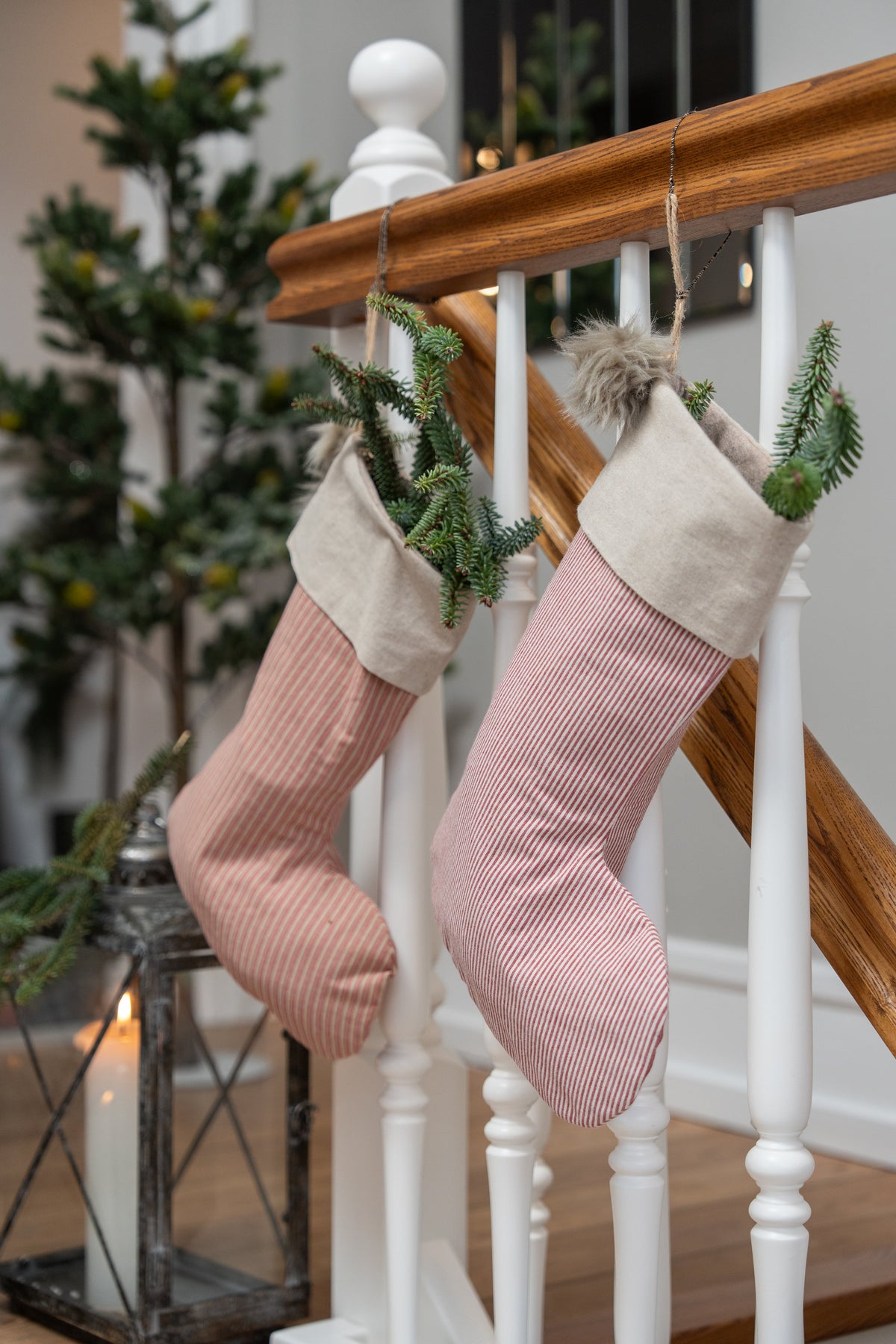 Christmas stockings hanging on the stair railing