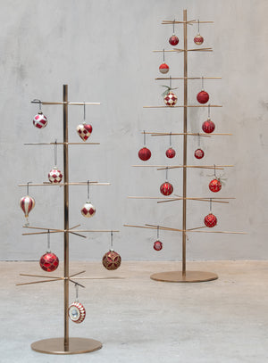 Metal Christmas trees decorated with red-toned glass ornaments from Speedtsberg
