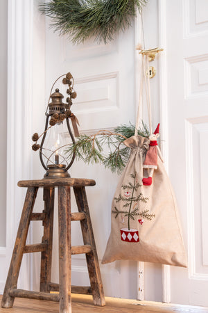 Christmas gift sack hanging on a door