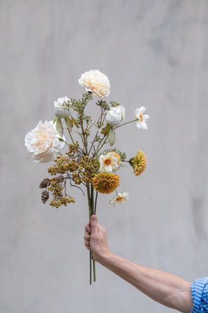 Bouquet of artificial flowers with a pinecone branch from Speedtsberg