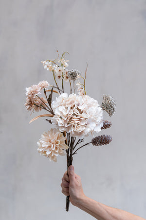 Bouquet of artificial pink flowers and glittered pinecone branches from Speedtsberg