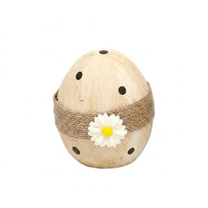Easter egg with thread and flower