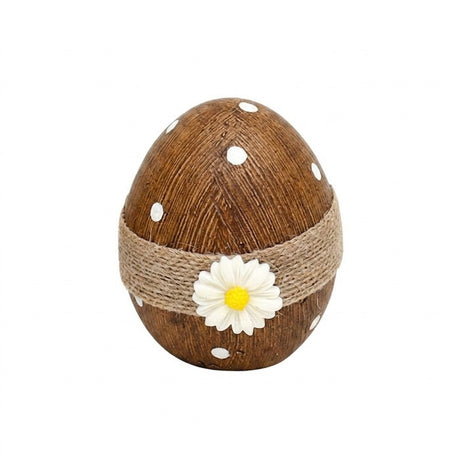 Easter egg with thread and flower