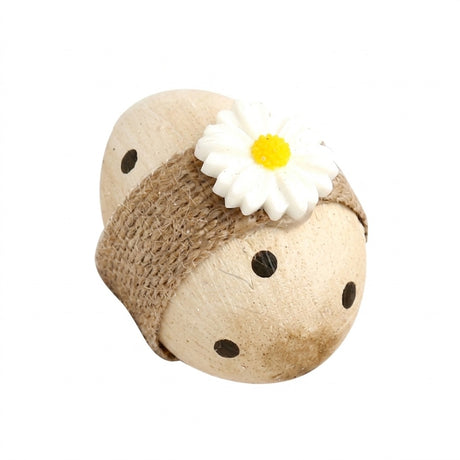 Easter egg with ribbon and flower