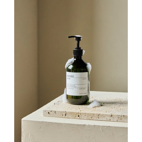 Meraki hand soap with foam on the bottle