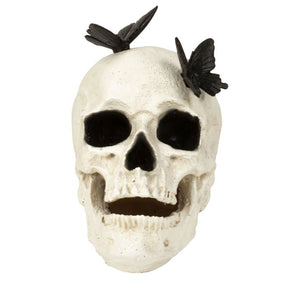 Kranium med sorte sommerfugle