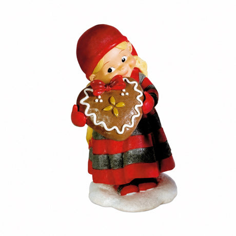 Baby elf with gingerbread heart