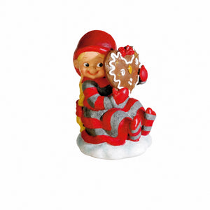 Baby elf with gingerbread heart